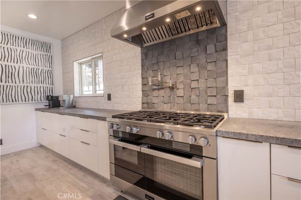 Interior, Kitchen, Recessed Lighting, Stainless Steel Appliances, Stone Walls, Wood Texture Flooring