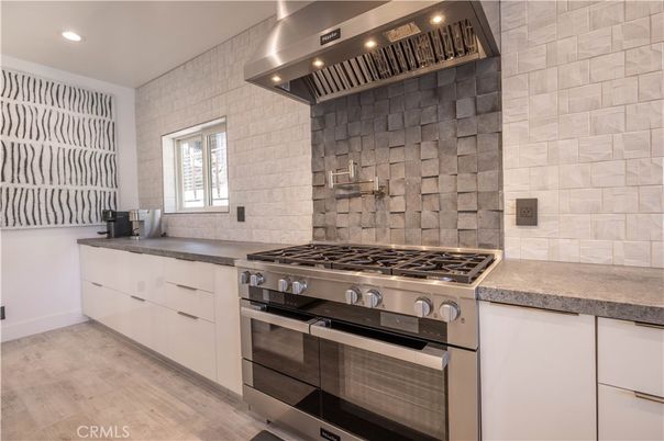 Interior, Kitchen, Recessed Lighting, Stainless Steel Appliances, Stone Walls, Wood Texture Flooring