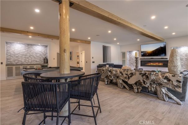 Dining room, Fireplace, Interior, Living room, Recessed Lighting, Wooden Beams, Wood Texture Flooring
