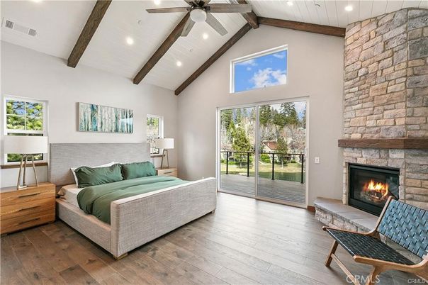 Bedroom, Fireplace, Interior, Recessed Lighting, Stone Walls, Wooden Beams, Wood Texture Flooring