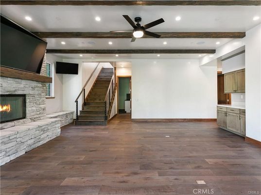 Empty room, Fireplace, Interior, Recessed Lighting, Wooden Beams, Wood Texture Flooring