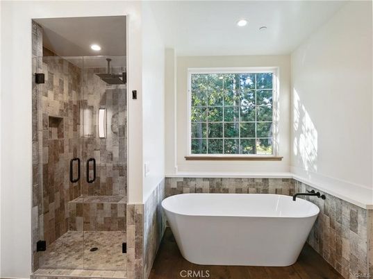 Bathroom, Free Standing Baths, Glass Shower, Interior, Recessed Lighting, Wood Texture Flooring