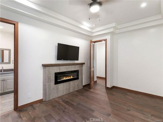 Empty room, Fireplace, Interior, Recessed Lighting, Wood Texture Flooring
