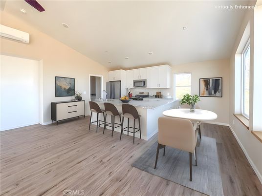 Dining room, Interior, Kitchen, Recessed Lighting, Stainless Steel Appliances, Wood Texture Flooring