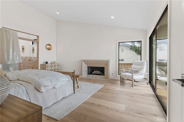 Bedroom, Fireplace, Interior, Recessed Lighting, Wood Texture Flooring