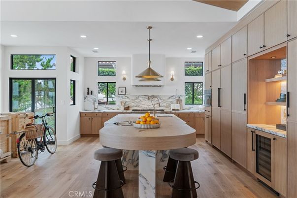 Interior, Kitchen, Marble Walls, Pendant Lights, Recessed Lighting, Wood Texture Flooring