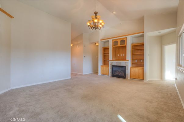 Chandelier, Empty room, Fireplace, Interior