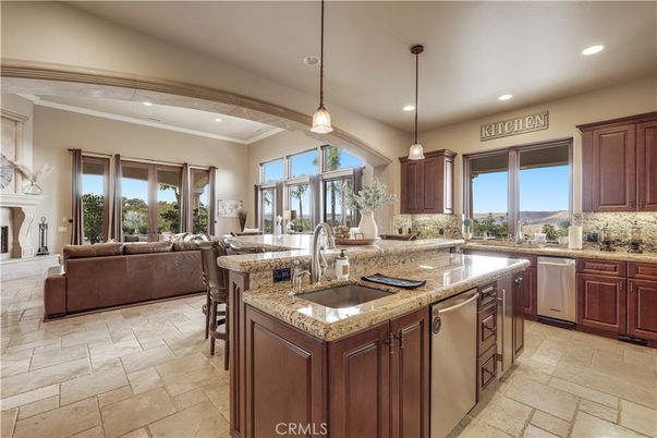 Fireplace, Interior, Kitchen, Living room, Pendant Lights, Recessed Lighting, Stainless Steel Appliances