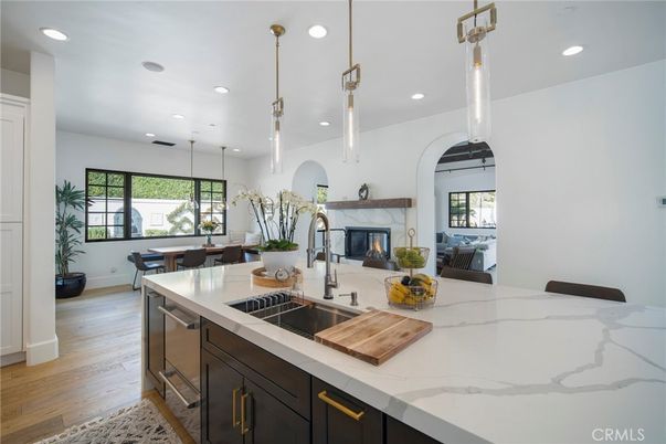 Dining room, Fireplace, Interior, Kitchen, Pendant Lights, Recessed Lighting, Stainless Steel Appliances, Wood Texture Flooring