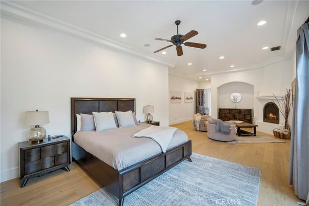 Bedroom, Fireplace, Interior, Recessed Lighting, Wood Texture Flooring