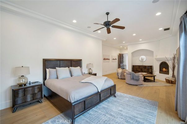 Bedroom, Fireplace, Interior, Recessed Lighting, Wood Texture Flooring