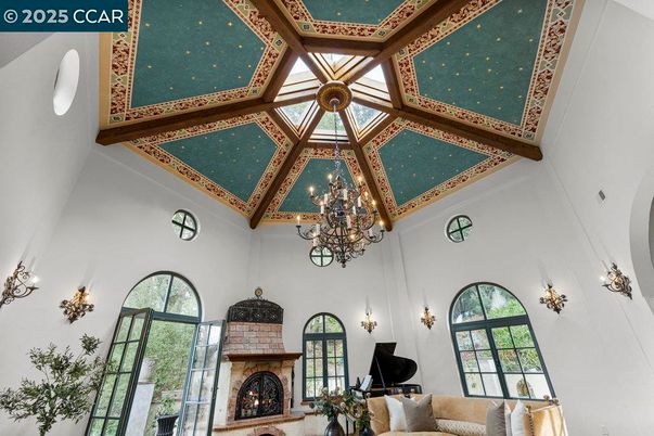 Chandelier, Fireplace, Interior, Living room, Piano, Wooden Beams