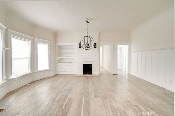 Chandelier, Empty room, Fireplace, Interior, Pendant Lights, Wood Texture Flooring