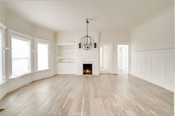 Chandelier, Empty room, Fireplace, Interior, Pendant Lights, Wood Texture Flooring