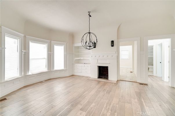 Chandelier, Empty room, Fireplace, Interior, Pendant Lights, Wood Texture Flooring