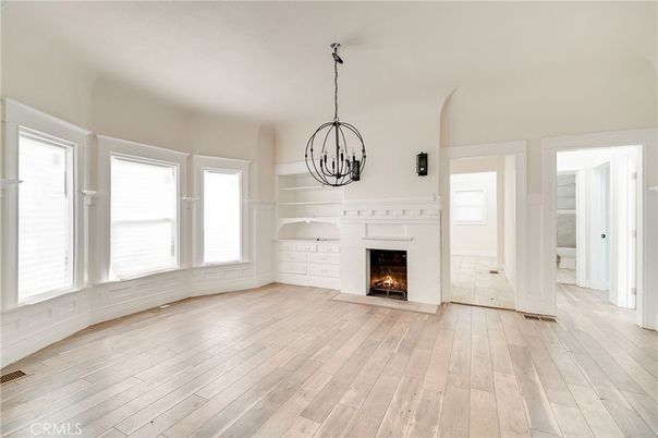 Chandelier, Empty room, Fireplace, Interior, Pendant Lights, Wood Texture Flooring