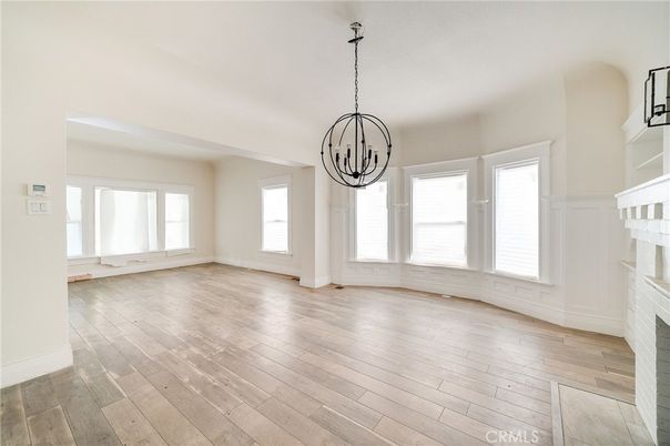 Empty room, Fireplace, Interior, Pendant Lights, Wood Texture Flooring