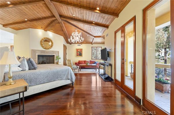 Bedroom, Chandelier, Fireplace, Interior, Living room, Recessed Lighting, Wooden Beams, Wooden Ceilings, Wood Texture Flooring