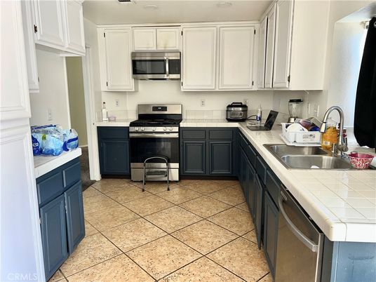 Interior, Kitchen, Stainless Steel Appliances, Tile Countertops
