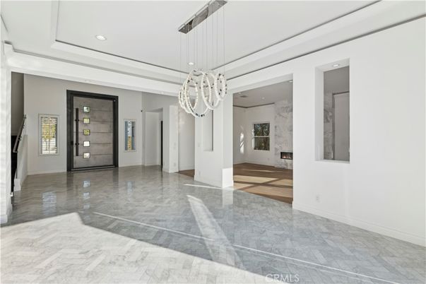 Empty room, Fireplace, Interior, Marble, Pendant Lights, Recessed Lighting, Wood Texture Flooring