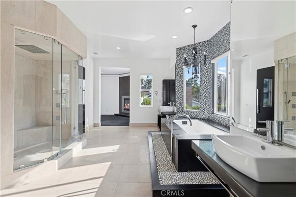 Bathroom, Chandelier, Dual Sink Vanities, Fireplace, Glass Shower, Interior, Recessed Lighting