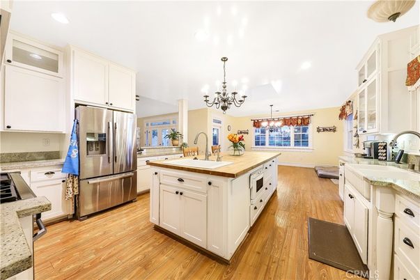 Chandelier, Interior, Kitchen, Recessed Lighting, Stainless Steel Appliances, Wood Texture Flooring