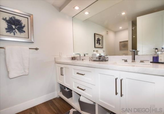 Bathroom, Dual Sink Vanities, Interior, Recessed Lighting, Wood Texture Flooring
