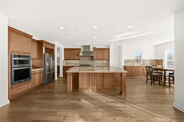 Dining room, Interior, Kitchen, Recessed Lighting, Stainless Steel Appliances, Wood Texture Flooring