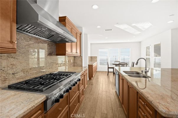 Dining room, Interior, Kitchen, Recessed Lighting, Stainless Steel Appliances, Wood Texture Flooring