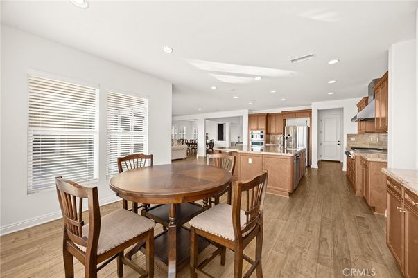 Dining room, Interior, Kitchen, Recessed Lighting, Stainless Steel Appliances, Wood Texture Flooring