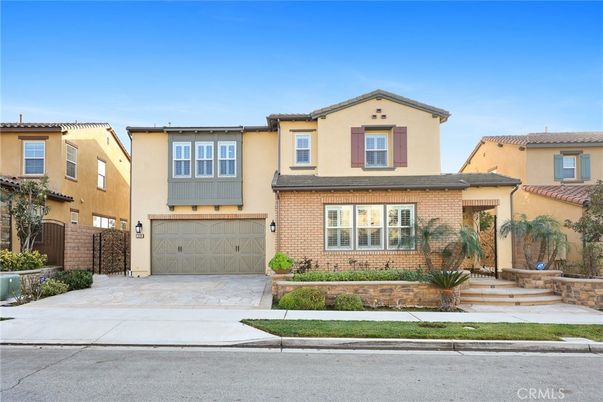 Attached, Exterior, Facade, Brick Facade, Mediterranean