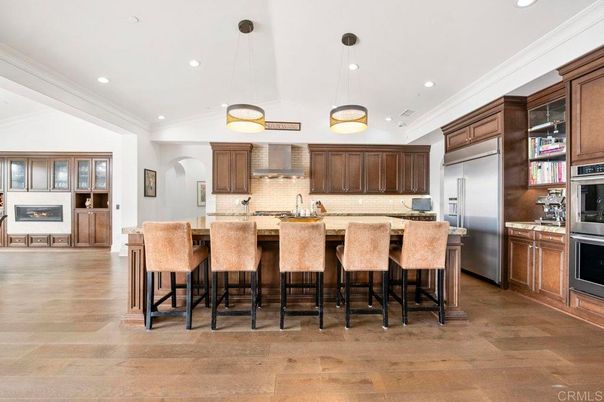 Fireplace, Interior, Kitchen, Pendant Lights, Recessed Lighting, Stainless Steel Appliances, Wood Texture Flooring
