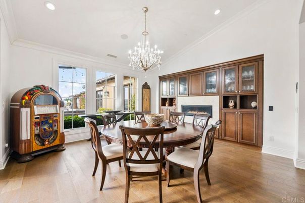 Chandelier, Dining room, Fireplace, Interior, Recessed Lighting, Wood Texture Flooring