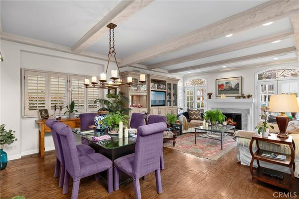 Chandelier, Dining room, Fireplace, Interior, Living room, Recessed Lighting, Wooden Beams, Wood Texture Flooring
