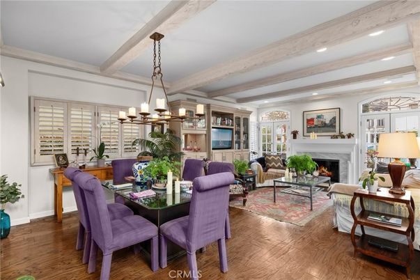 Chandelier, Dining room, Fireplace, Interior, Living room, Recessed Lighting, Wooden Beams, Wood Texture Flooring