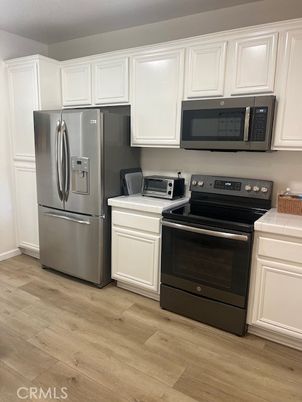 Interior, Kitchen, Tile Countertops, Wood Texture Flooring