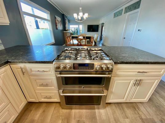 Dining room, Interior, Kitchen, Pendant Lights, Stainless Steel Appliances, Wood Texture Flooring