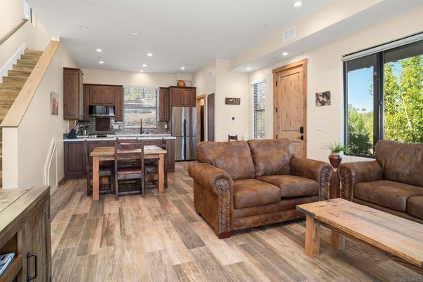Dining room, Interior, Kitchen, Living room, Recessed Lighting, Stainless Steel Appliances, Wood Texture Flooring