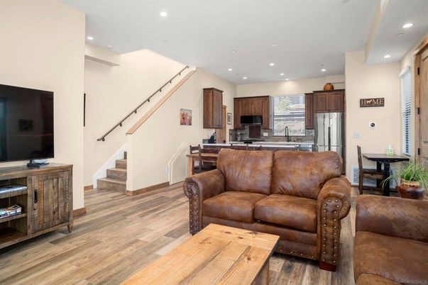 Dining room, Interior, Kitchen, Living room, Recessed Lighting, Stainless Steel Appliances, Wood Texture Flooring