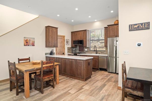 Dining room, Interior, Kitchen, Recessed Lighting, Stainless Steel Appliances, Wood Texture Flooring
