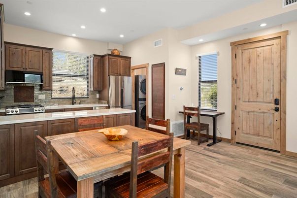 Dining room, Interior, Kitchen, Recessed Lighting, Stainless Steel Appliances, Wood Texture Flooring