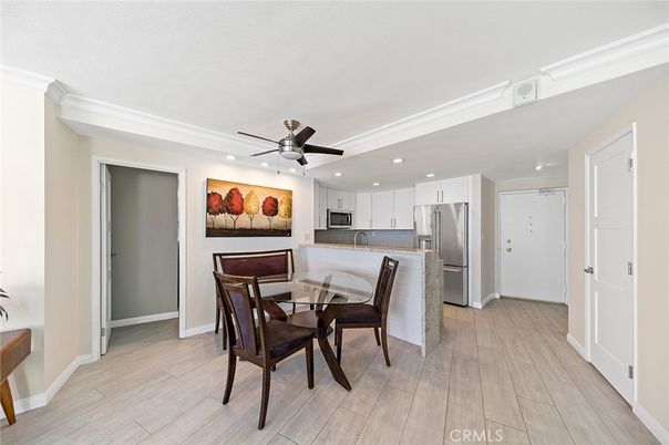 Dining room, Interior, Kitchen, Recessed Lighting, Stainless Steel Appliances, Wood Texture Flooring