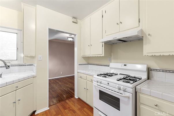 Interior, Kitchen, Tile Countertops, Wood Texture Flooring