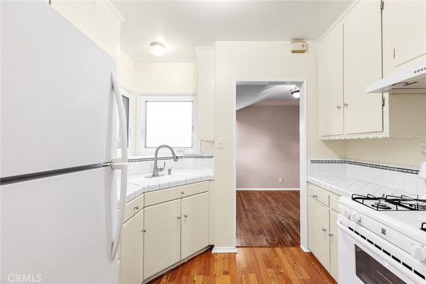 Interior, Kitchen, Tile Countertops, Wood Texture Flooring