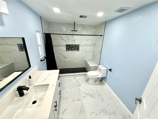 Bathroom, Dual Sink Vanities, Interior, Marble, Marble Walls, Recessed Lighting