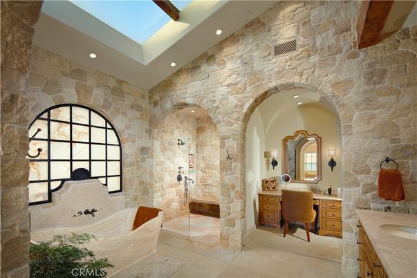 Bathroom, Dual Sink Vanities, Glass Shower, Interior, Recessed Lighting, Stone Walls