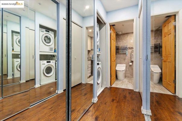 Bathroom, Interior, Marble, Recessed Lighting, Utility Closets, Washer, Wood Texture Flooring