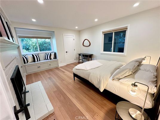 Bedroom, Fireplace, Interior, Recessed Lighting, Wood Texture Flooring