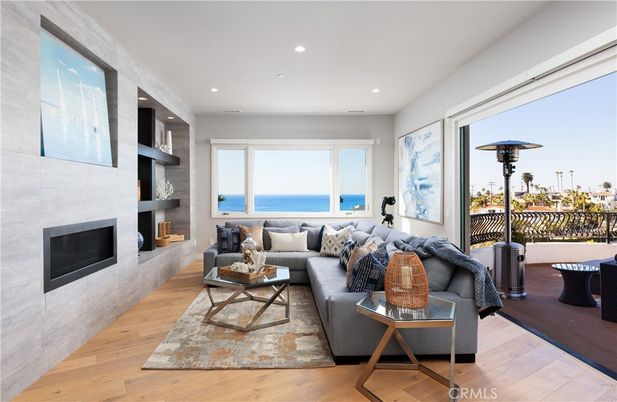 Fireplace, Interior, Living room, Recessed Lighting, Water, Wood Texture Flooring