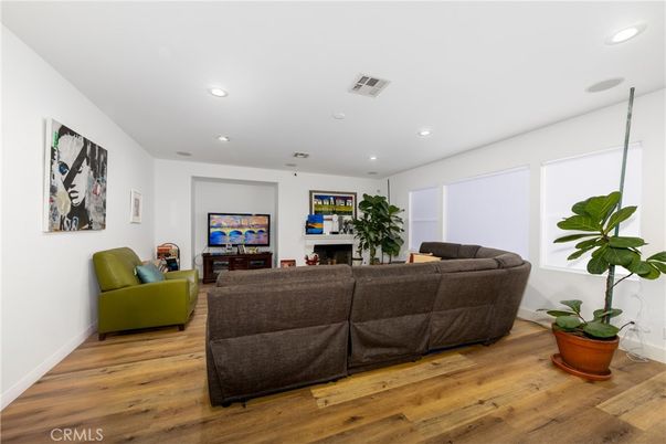 Fireplace, Interior, Living room, Recessed Lighting, Wood Texture Flooring